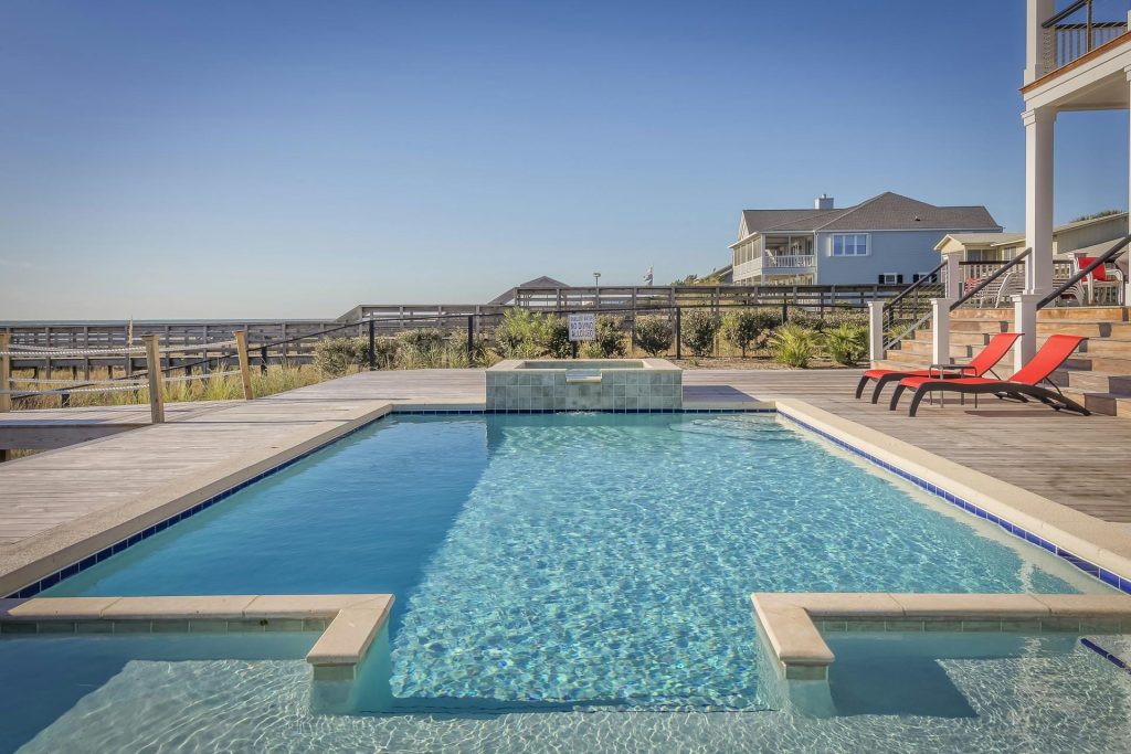 pexels-photo-261327-261327 Stunning infinity pool at a seaside resort, perfect for relaxation and leisure travel.